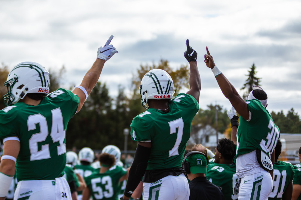 Football players prepare for a game